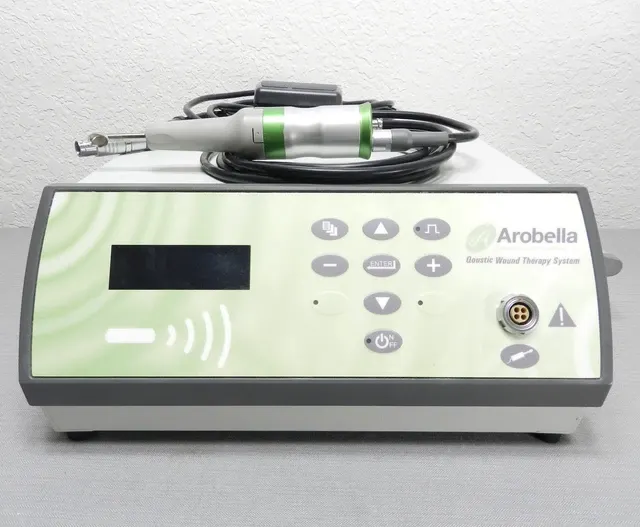 A clinician operating an advanced treatment device